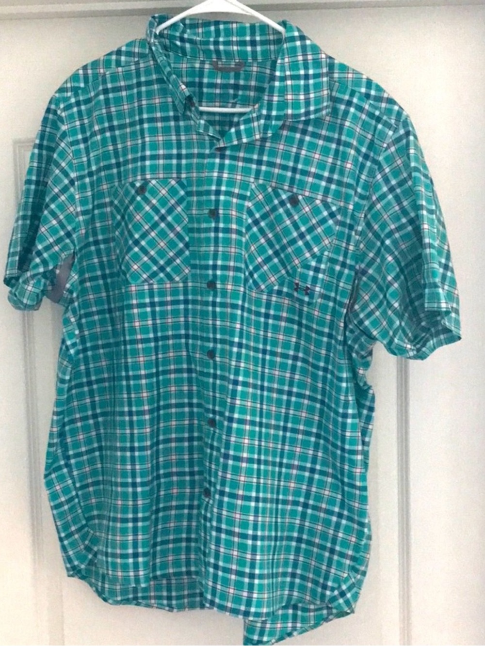 Under Armour shirt.